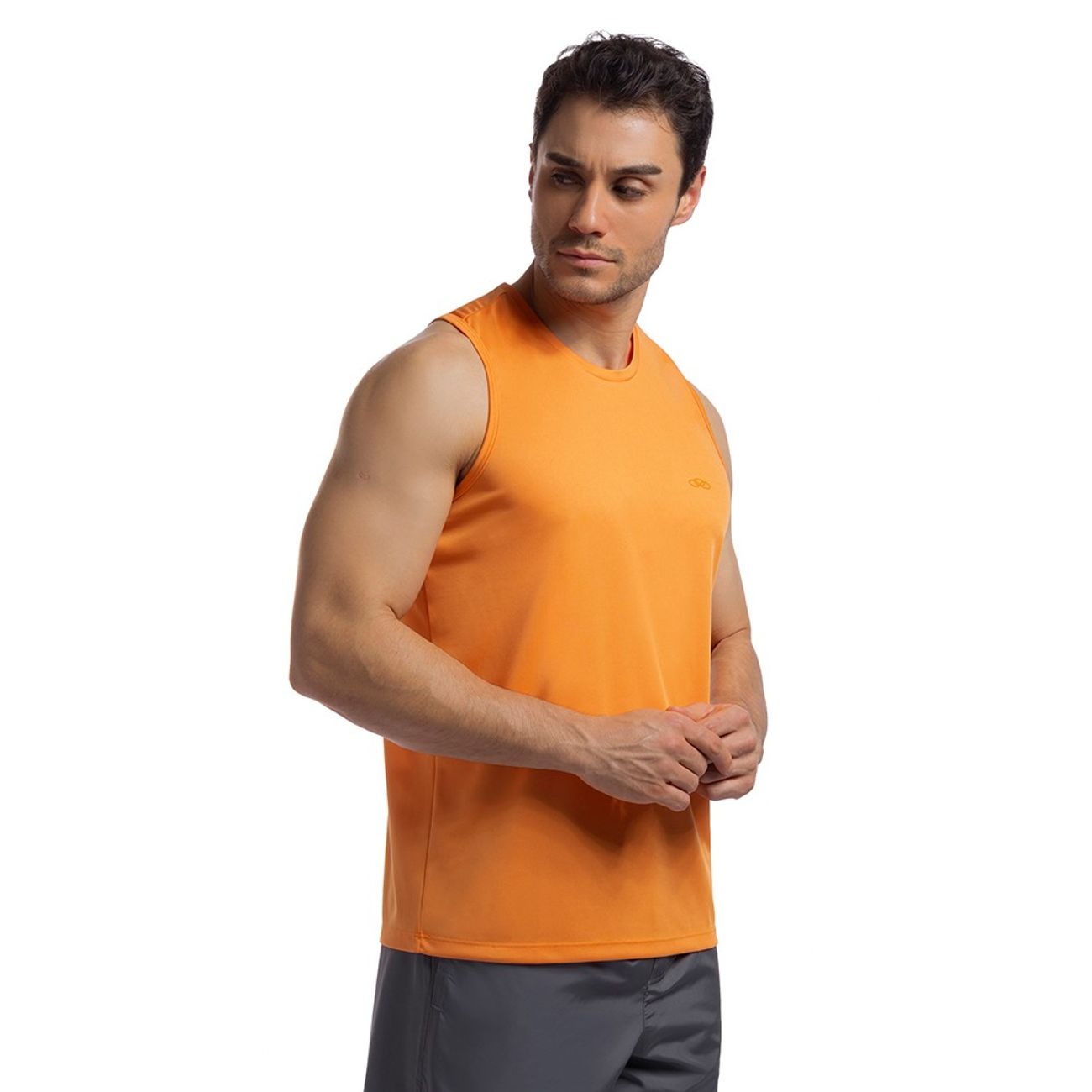 POLERA ESSENTIAL SIN MANGAS NARANJA HOMBRE